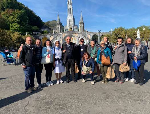 Lourdes: na ocajion per far comunanza